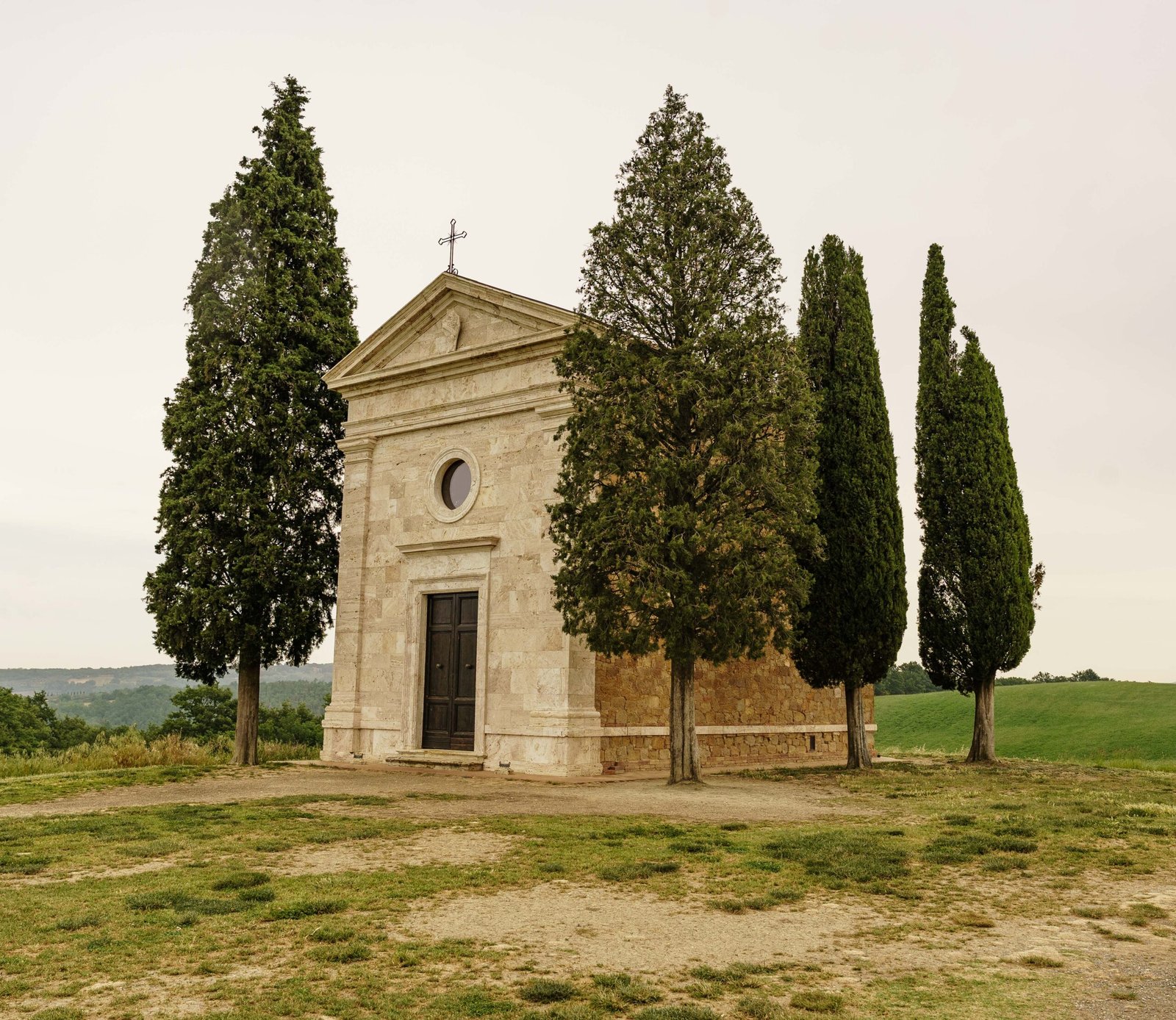 The Chapel of Madonna di Vitaleta with cypresses in the Val d'Orcia