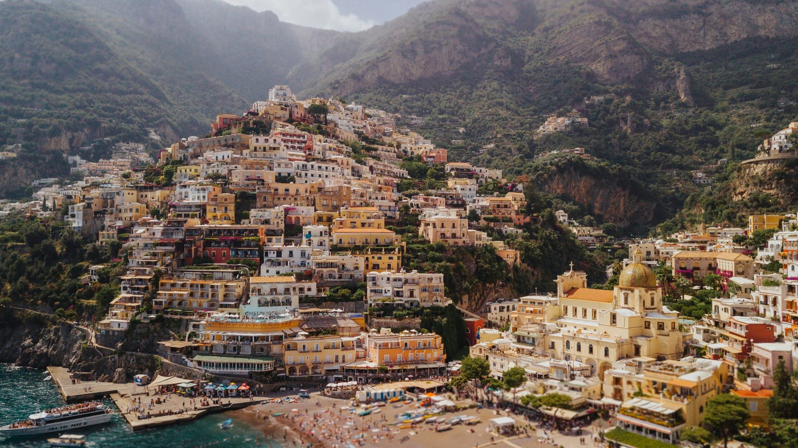 Colourful houses of Positano climbing the hillside above the sea