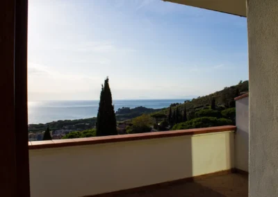 View from the villa over the green hills and the coast of Castiglione della Pescaia