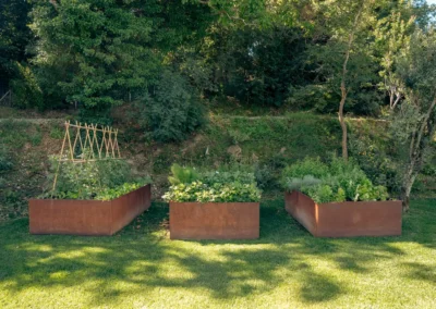 Kitchen garden with corten-steel raised vegetable beds at Villa Santa Maria Nuova, Cortona